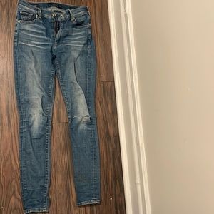 Lucky brand womens skinny jeans. Tears at both knees